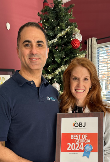 Drs. Pete and Christi Ghaleb accepting the Best of Georgia award